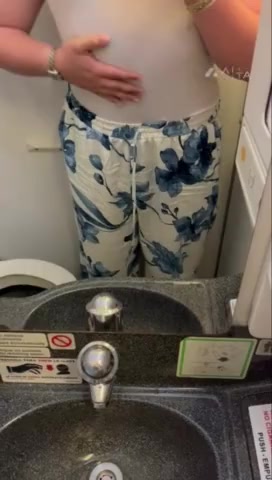 Thumbnail for JanneAnturi's Premium Video Horny in the airplane bathroom. Would you fuck me and make me cum here? I dare you